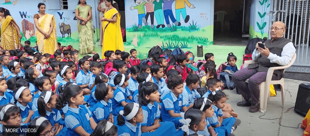 Dr. Anil mokashi telling stories to children