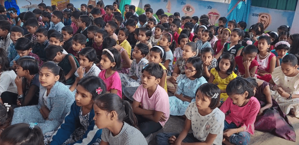 Dr. Anil Mokashi telling stories to children