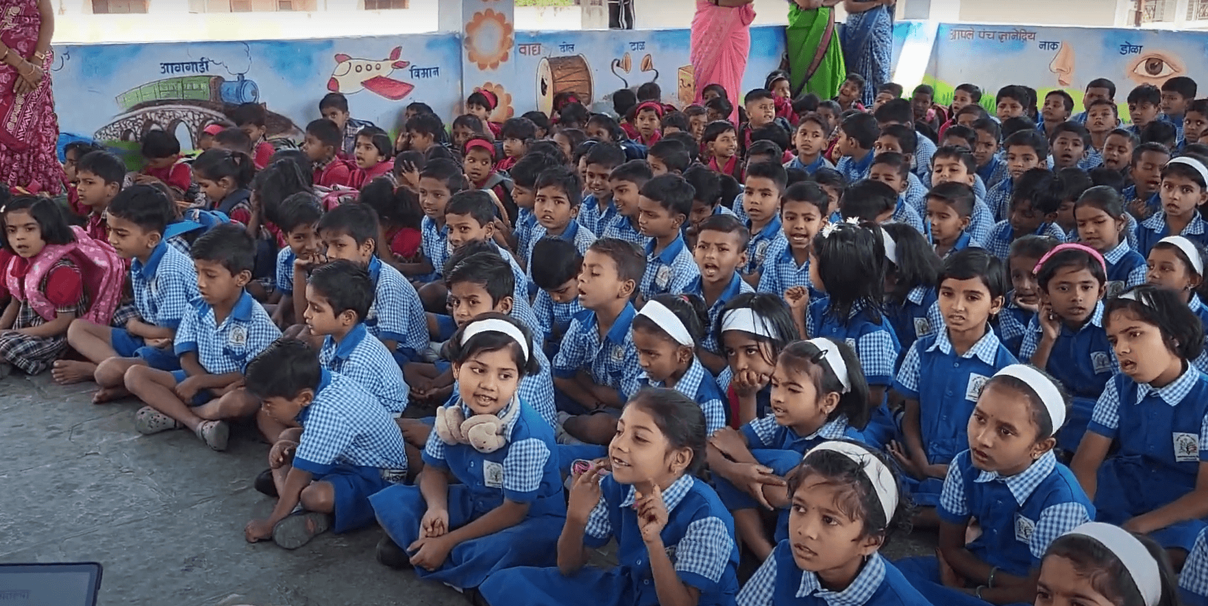 Dr. Anil Mokashi telling stories to children