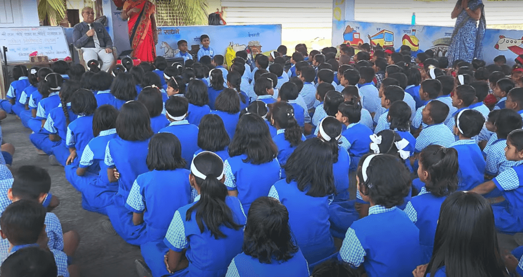 Dr. Anil Mokashi telling stories to children