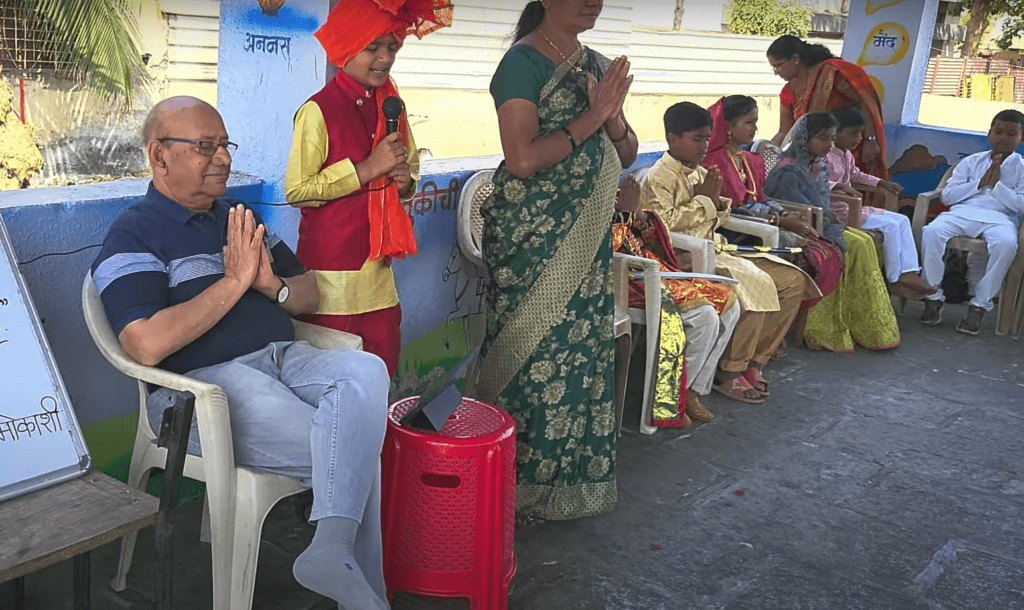 Dr. Anil Mokashi telling stories to children
