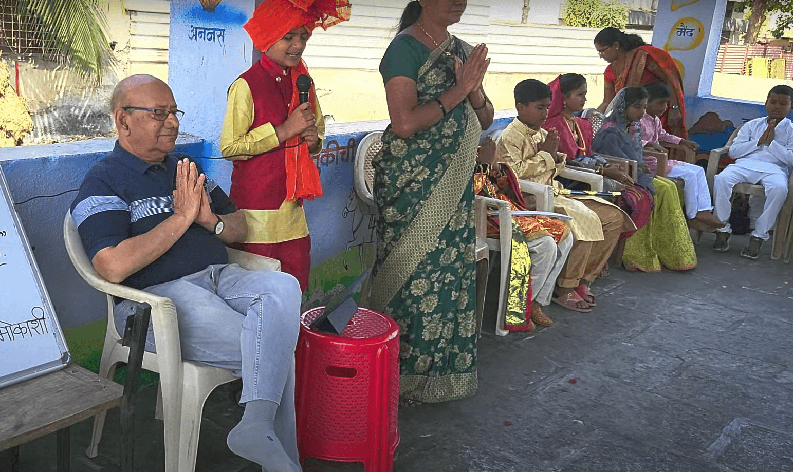 Dr. Anil Mokashi telling stories to children