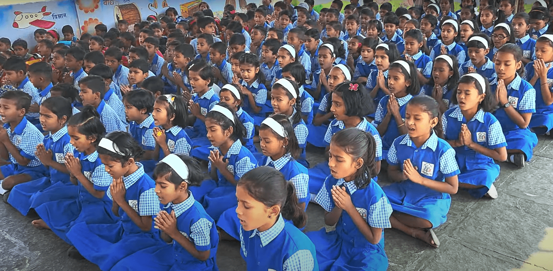 Dr. Anil Mokashi telling stories to children